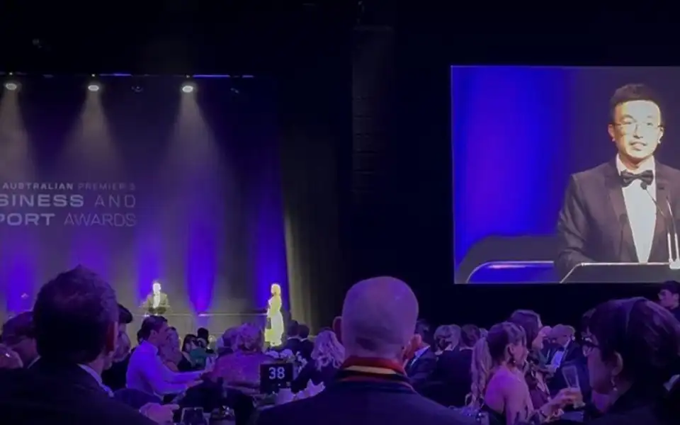 Hinney Lo on screen at the 2025 South Australian Premier's Business and Export Awards